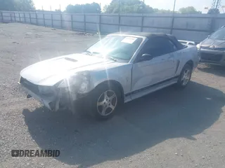 2002 Ford Mustang Deluxe with VIN 1FAFP44432F205991, listed as a IAAI auction lot 42144709 with 138,119 mi miles and . Bid and sale history available at DreamBid. Image 2.