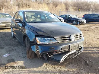 2015 Volkswagen Jetta SEL z VIN 3VWL17AJ1FM312759, wystawiony jako IAAI lot #41541982 z przebiegiem 80 350 mil mil oraz . Historia ofert i sprzedaży dostępna na DreamBid. Obrazek 1.