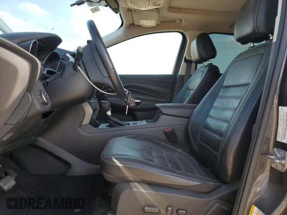 2017 Ford Escape SE with VIN 1FMCU0GD7HUD93215, listed as a Copart auction lot 54966295 with 153,704 mi miles and Salvage Title. Bid and sale history available at DreamBid. Image 7.