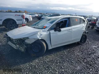 2018 Subaru Impreza with VIN 4S3GTAA62J3742382, listed as a IAAI auction lot 40836283 with 69,574 mi miles. Bid and sale history available at carsss.com. Image 2.