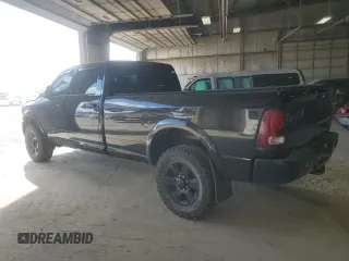 2014 Ram 3500 Laramie with VIN 3C63R3JL9EG258069, listed as a Copart auction lot 71571664 with 104,983 mi miles and Salvage Title. Bid and sale history available at carsss.com. Image 2.