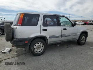 1999 Honda CR-V LX with VIN JHLRD2843XC011570, listed as a Copart auction lot 46330315 with 143,925 mi miles and Salvage Title. Bid and sale history available at carsss.com. Image 3.