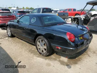 2002 Ford Thunderbird Hardtop Premium z VIN 1FAHP60A22Y107619, wystawiony jako Copart lot #55755765 z przebiegiem 32 306 mil mil oraz Nie do naprawy • Non repairable. Historia ofert i sprzedaży dostępna na DreamBid. Obrazek 2.