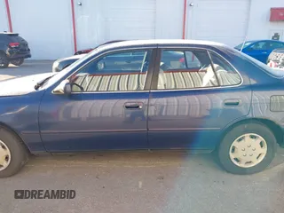 1994 Toyota Camry LE with VIN 4T1SK12EXRU374215, listed as a IAAI auction lot 41581093 with 80,397 mi miles. Bid and sale history available at carsss.com. Image 14.