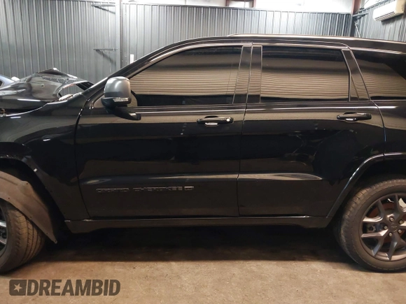 2021 Jeep Grand Cherokee Limited with VIN 1C4RJFBG3MC562643, listed as a IAAI auction lot 41829277 with 69,314 mi miles and . Bid and sale history available at DreamBid. Image 14.