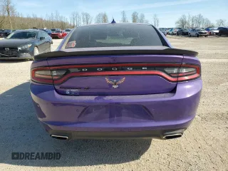 2019 Dodge Charger SXT with VIN 2C3CDXJG5KH520588, listed as a Copart auction lot 54910605 with 58,430 mi miles and Salvage Title. Bid and sale history available at DreamBid. Image 6.