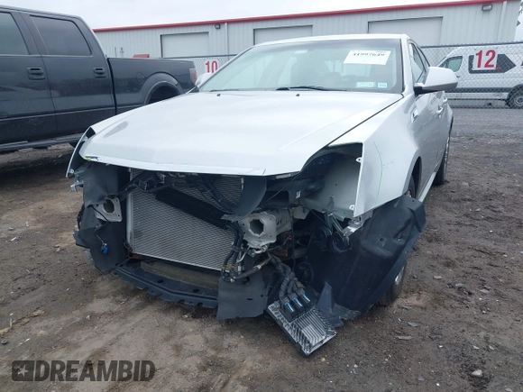 2012 Cadillac CTS z VIN 1G6DC5E52C0123719, wystawiony jako IAAI lot #41997649 z przebiegiem 79 705 mil mil oraz . Historia ofert i sprzedaży dostępna na DreamBid. Obrazek 6.