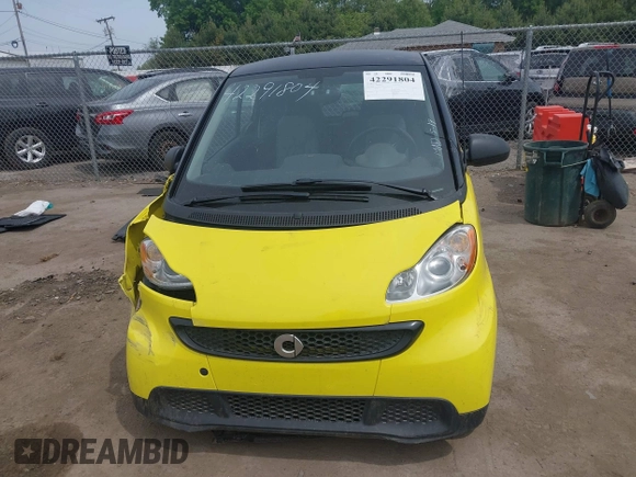 2013 Smart fortwo Pure with VIN WMEEJ3BA5DK663165, listed as a IAAI auction lot 42291804 with 105,074 mi miles and . Bid and sale history available at DreamBid. Image 12.