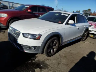 2015 Audi allroad Premium Plus with VIN WA1UFAFL5FA040210, listed as a Copart auction lot 87516935 with 128,648 mi miles and Salvage Title. Bid and sale history available at carsss.com. Image 1.
