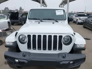 2023 Jeep Wrangler Sahara with VIN 1C4HJXEG5PW581632, listed as a IAAI auction lot 42462622 with 24,550 mi miles and . Bid and sale history available at DreamBid. Image 12.