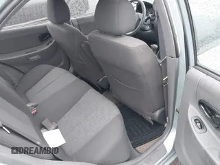 2003 Hyundai Accent GL with VIN KMHCG45C33U473080, listed as a IAAI auction lot 41868765 with 57,478 mi miles. Bid and sale history available at carsss.com. Image 8.