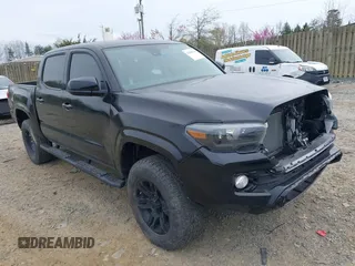2022 Toyota Tacoma SR z VIN 3TYCZ5AN8NT096091, wystawiony jako IAAI lot #41966344 z przebiegiem 6 536 mil mil oraz . Historia ofert i sprzedaży dostępna na DreamBid. Obrazek 1.