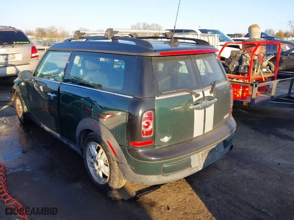 2013 MINI Cooper Clubman with VIN WMWZF3C57DT489934, listed as a IAAI auction lot 41290072 with 109,337 mi miles. Bid and sale history available at carsss.com. Image 3.