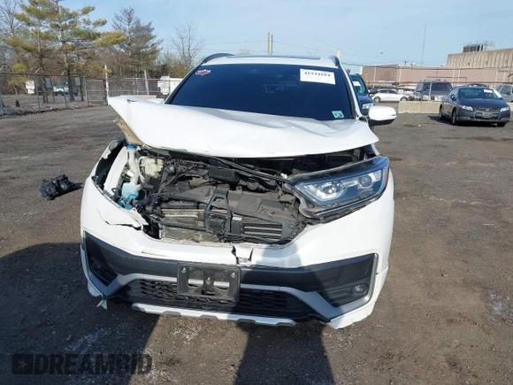 2020 Honda CR-V EX with VIN 2HKRW2H52LH638324, listed as a IAAI auction lot 41944104 with 31,852 mi miles and . Bid and sale history available at DreamBid. Image 6.
