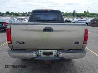 2001 Ford F-150 XL with VIN 2FTRX18W21CA32671, listed as a IAAI auction lot 42719774 with 244,348 mi miles and . Bid and sale history available at DreamBid. Image 6.