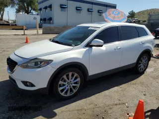 2014 Mazda CX-9 Grand Touring with VIN JM3TB3DA5E0431539, listed as a Copart auction lot 62418005 with 139,686 mi miles and Salvage title. Bid and sale history available at DreamBid. Image 1.