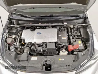 2021 Toyota Prius L Eco z VIN JTDKAMFU0M3140335, wystawiony jako Copart lot #61955845 z przebiegiem 96 071 mil mil oraz Czysty tytuł • Clean title. Historia ofert i sprzedaży dostępna na DreamBid. Obrazek 11.