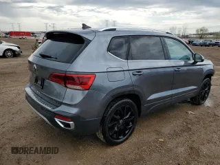 2022 Volkswagen Taos SE z VIN 3VVLX7B28NM041868, wystawiony jako Copart lot #53472735 z przebiegiem 80 509 mil mil oraz Szkody całkowita. Historia ofert i sprzedaży dostępna na DreamBid. Obrazek 3.
