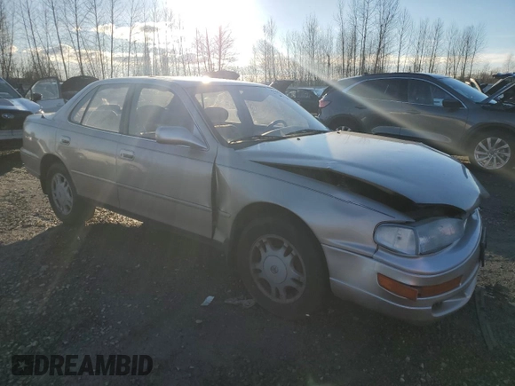 1994 Toyota Camry XLE with VIN JT2GK13E0R0038694, listed as a Copart auction lot 87843865 with 175,134 mi miles and Salvage Title. Bid and sale history available at carsss.com. Image 4.