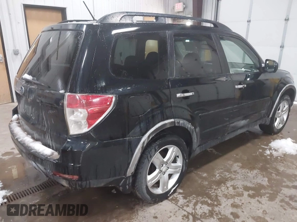 2009 Subaru Forester X with VIN JF2SH63629H743523, listed as a IAAI auction lot 41925173 with 196,469 mi miles and . Bid and sale history available at DreamBid. Image 4.