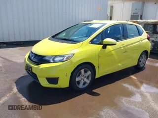 2016 Honda Fit LX with VIN JHMGK5H56GX011347, listed as a IAAI auction lot 42067854 with 106,969 mi miles and . Bid and sale history available at DreamBid. Image 2.