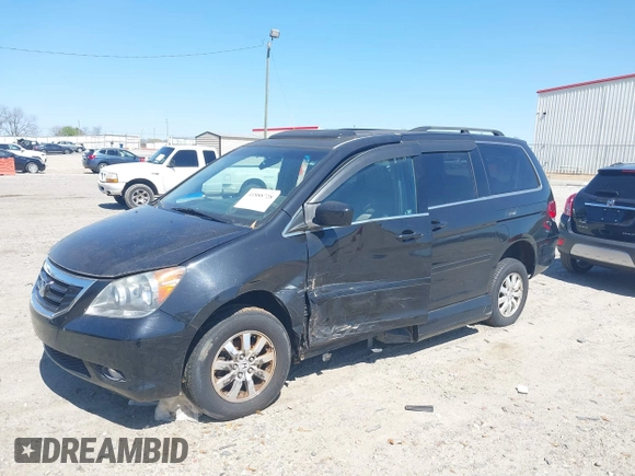2010 Honda Odyssey EX-L with VIN 5FNRL3H65AB102230, listed as a IAAI auction lot 41888728 with 154,164 mi miles and . Bid and sale history available at DreamBid. Image 2.