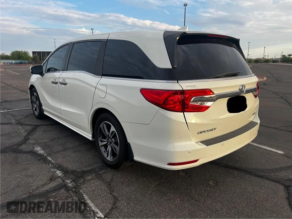 2019 Honda Odyssey Touring z VIN 5FNRL6H86KB053432, wystawiony jako Copart lot #65482425 z przebiegiem 87 470 mil mil oraz Szkoda całkowita • Salvage title. Historia ofert i sprzedaży dostępna na DreamBid. Obrazek 3.