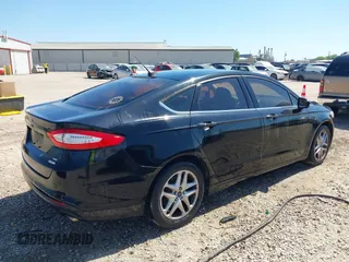 2016 Ford Fusion SE with VIN 3FA6P0HD3GR333466, listed as a IAAI auction lot 42034240 with 184,577 mi miles. Bid and sale history available at carsss.com. Image 4.
