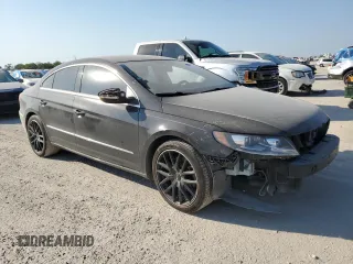 2014 Volkswagen CC R-Line with VIN WVWBN7AN7EE537598, listed as a Copart auction lot 73974244 with 139,476 mi miles and Salvage Title. Bid and sale history available at carsss.com. Image 4.