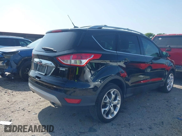 2016 Ford Escape Titanium with VIN 1FMCU0JX5GUC88013, listed as a IAAI auction lot 41933751 with 77,789 mi miles. Bid and sale history available at carsss.com. Image 4.