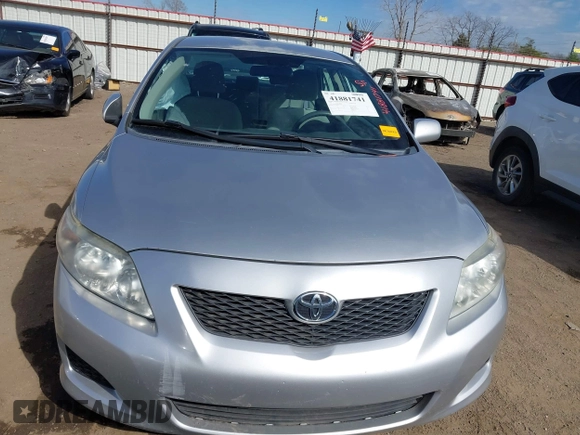 2009 Toyota Corolla with VIN 1NXBU40E39Z092092, listed as a IAAI auction lot 41881741 with 144,309 mi miles. Bid and sale history available at carsss.com. Image 12.
