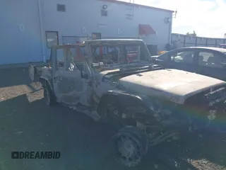 2015 Jeep Wrangler Unlimited Rubicon with VIN 1C4BJWFG9FL650885, listed as a IAAI auction lot 40438130 with Not provided miles and . Bid and sale history available at DreamBid. Image 1.