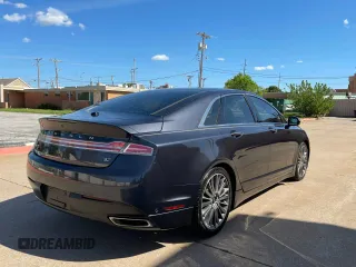 2013 Lincoln MKZ z VIN 3LN6L2GK3DR804377, wystawiony jako Copart lot #62822515 z przebiegiem 167 195 mil mil oraz Czysty tytuł • Clean title. Historia ofert i sprzedaży dostępna na DreamBid. Obrazek 4.