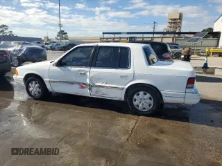 1994 Plymouth Acclaim z VIN 3P3AA4630RT275149, wystawiony jako Copart lot #79877324 z przebiegiem 125 175 mil mil oraz Szkody całkowita. Historia ofert i sprzedaży dostępna na DreamBid. Obrazek 2.
