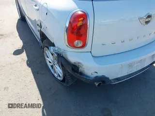 2016 MINI Countryman S z VIN WMWZC5C57GWU00192, wystawiony jako IAAI lot #42345660 z przebiegiem 57 683 mil mil oraz . Historia ofert i sprzedaży dostępna na DreamBid. Obrazek 6.