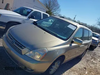 2009 Kia Sedona LX with VIN KNDMB233496278214, listed as a IAAI auction lot 41815456 with 205,799 mi miles. Bid and sale history available at carsss.com. Image 2.