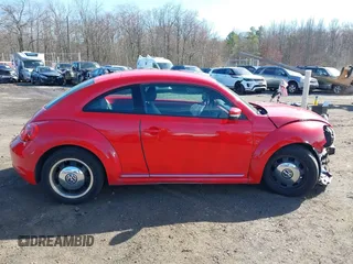 2012 Volkswagen Beetle 2.5L PZEV with VIN 3VWJP7AT5CM631505, listed as a IAAI auction lot 41733955 with 35,519 mi miles. Bid and sale history available at carsss.com. Image 13.