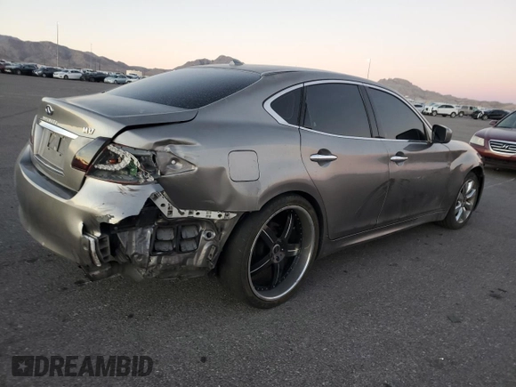 2011 Infiniti M37 with VIN JN1BY1AP3BM321581, listed as a Copart auction lot 79275854 with 215,496 mi miles and Salvage Title. Bid and sale history available at carsss.com. Image 3.
