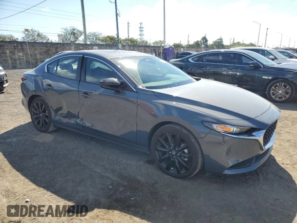 2025 Mazda 3 S Carbon Edition with VIN 3MZBPBCM4SM454067, listed as a Copart auction lot 43981255 with 2,396 mi miles and Clean Title. Bid and sale history available at DreamBid. Image 4.