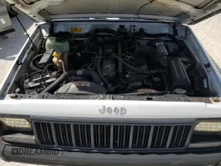 1994 Jeep Cherokee SE with VIN 1J4FT28SXRL151422, listed as a Copart auction lot 77358594 with 74,628 mi miles and Salvage Title. Bid and sale history available at carsss.com. Image 11.