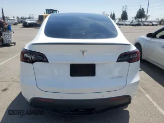 2022 Tesla Model Y Performance with VIN 7SAYGDEFXNF407340, listed as a Copart auction lot 54376895 with 56,709 mi miles and Salvage Title. Bid and sale history available at DreamBid. Image 6.