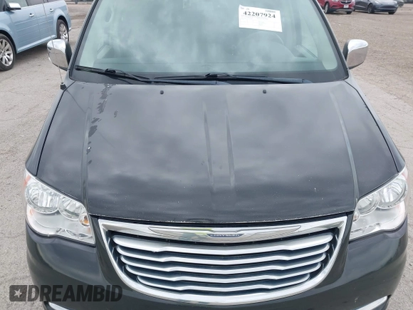 2012 Chrysler Town & Country Touring L with VIN 2C4RC1CG1CR163442, listed as a IAAI auction lot 42207924 with 197,111 mi miles and . Bid and sale history available at DreamBid. Image 6.