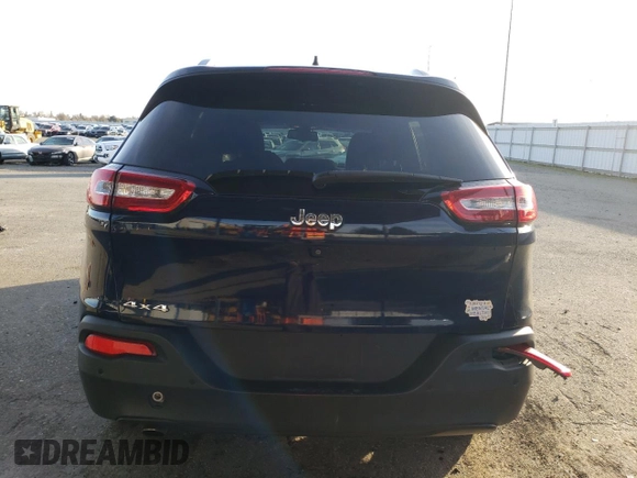 2016 Jeep Cherokee 75th Anniversary with VIN 1C4PJMCB7GW145110, listed as a Copart auction lot 87393294 with 141,501 mi miles and Salvage Title. Bid and sale history available at carsss.com. Image 6.