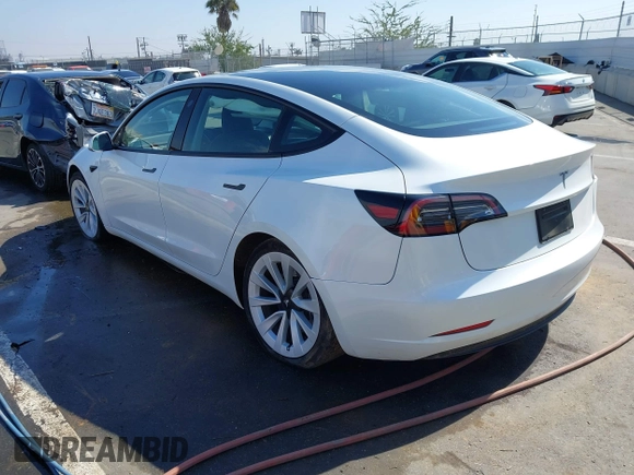 2023 Tesla Model 3 with VIN 5YJ3E1EA9PF640015, listed as a IAAI auction lot 41622086 with 15,622 mi miles and . Bid and sale history available at carsss.com. Image 3.