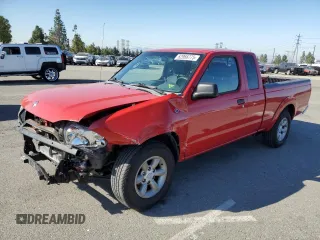 2004 Nissan Frontier XE with VIN 1N6DD26T94C424457, listed as a Copart auction lot 62966775 with 128,792 mi miles and Salvage title. Bid and sale history available at DreamBid. Image 1.
