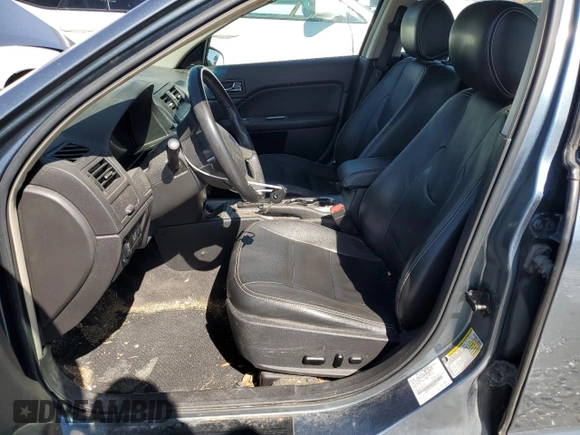 2012 Ford Fusion Hybrid with VIN 3FADP0L33CR258753, listed as a Copart auction lot 74201724 with 158,434 mi miles and Salvage title. Bid and sale history available at DreamBid. Image 7.