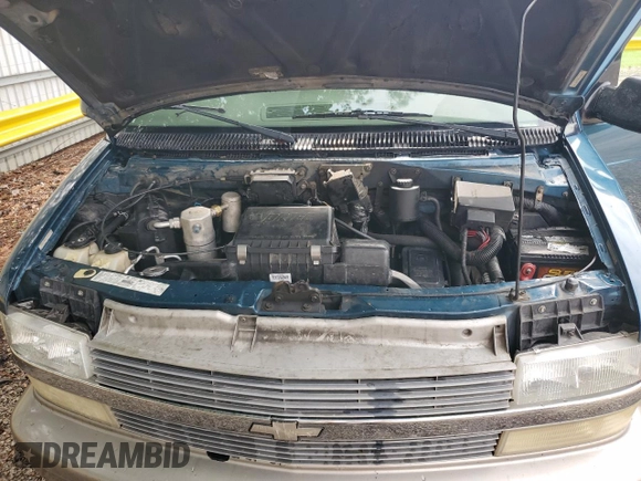 2002 Chevrolet Astro with VIN 1GNDM19X02B110895, listed as a Copart auction lot 70704784 with 176,736 mi miles and Salvage Title. Bid and sale history available at carsss.com. Image 13.