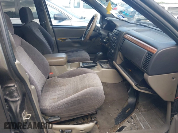 1999 Jeep Grand Cherokee Laredo with VIN 1J4GW58S2XC524365, listed as a IAAI auction lot 42432625 with 284,942 mi miles and . Bid and sale history available at DreamBid. Image 5.