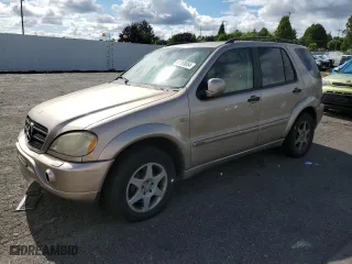 2001 Mercedes-Benz M-Class with VIN 4JGAB72EX1A243970, listed as a Copart auction lot 61308054 with 133,461 mi miles and Salvage Title. Bid and sale history available at carsss.com. Image 1.