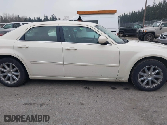 2007 Chrysler 300 Touring with VIN 2C3LA53GX7H871255, listed as a IAAI auction lot 41317732 with 145,223 mi miles and . Bid and sale history available at DreamBid. Image 12.